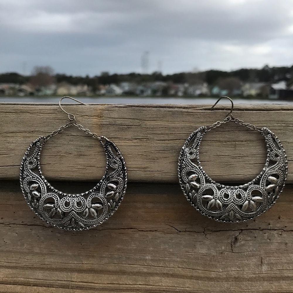 Beautiful ornate silver earrings. Never worn.